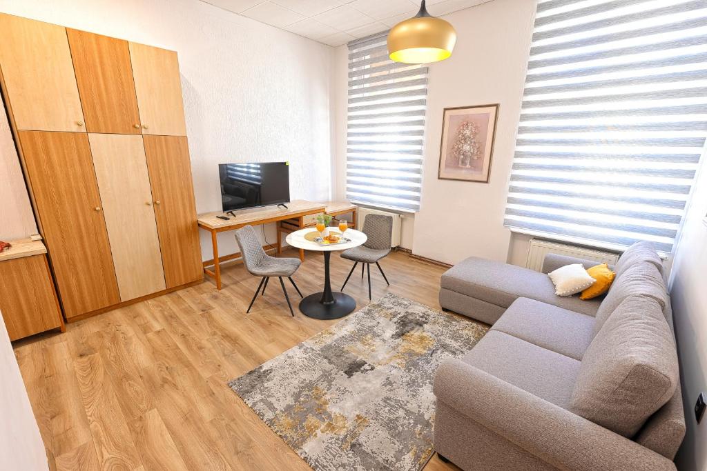 TV a/nebo společenská místnost v ubytování Apartmani Maltar