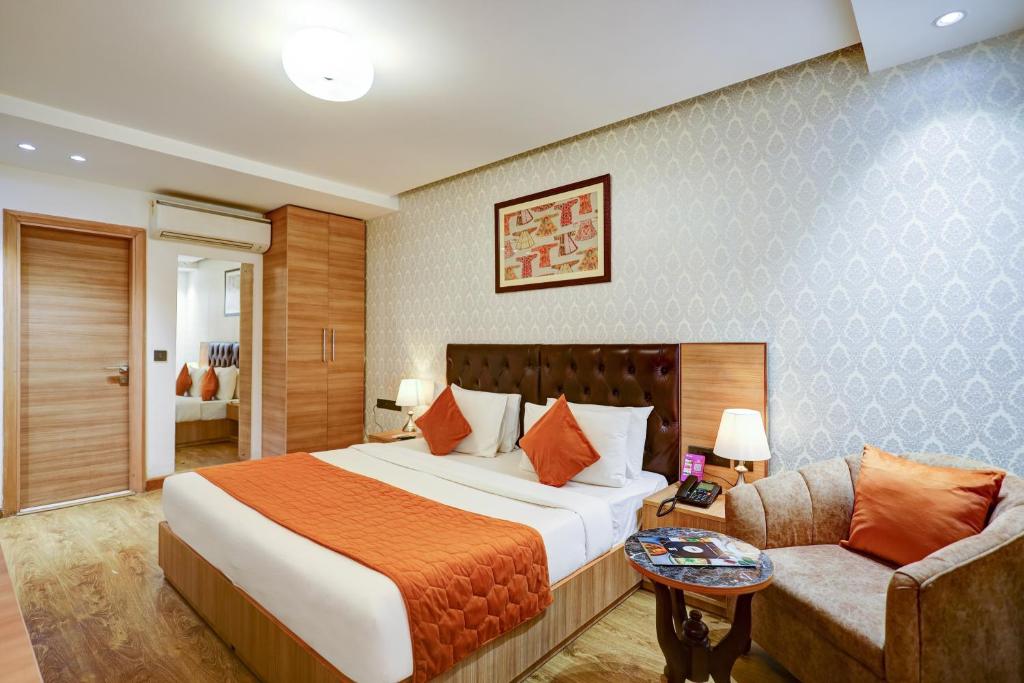 Postel nebo postele na pokoji v ubytování Hotel 91 Huda City Centre