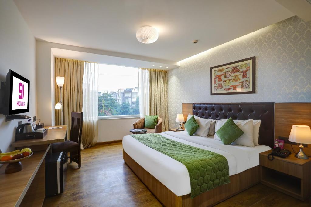 TV a/nebo společenská místnost v ubytování Hotel 91 Huda City Centre
