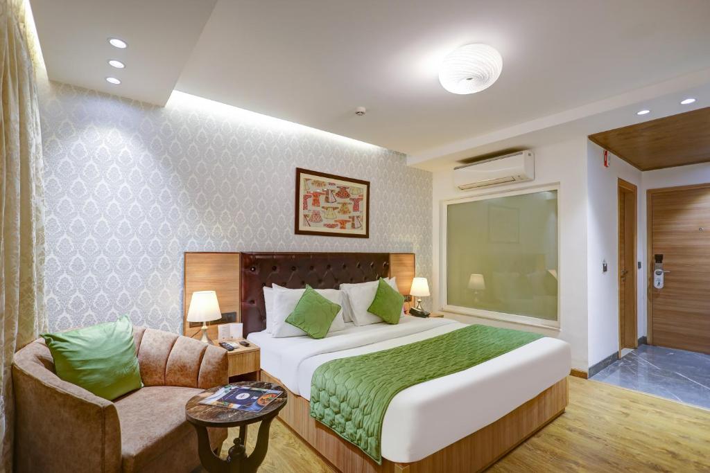 Postel nebo postele na pokoji v ubytování Hotel 91 Huda City Centre