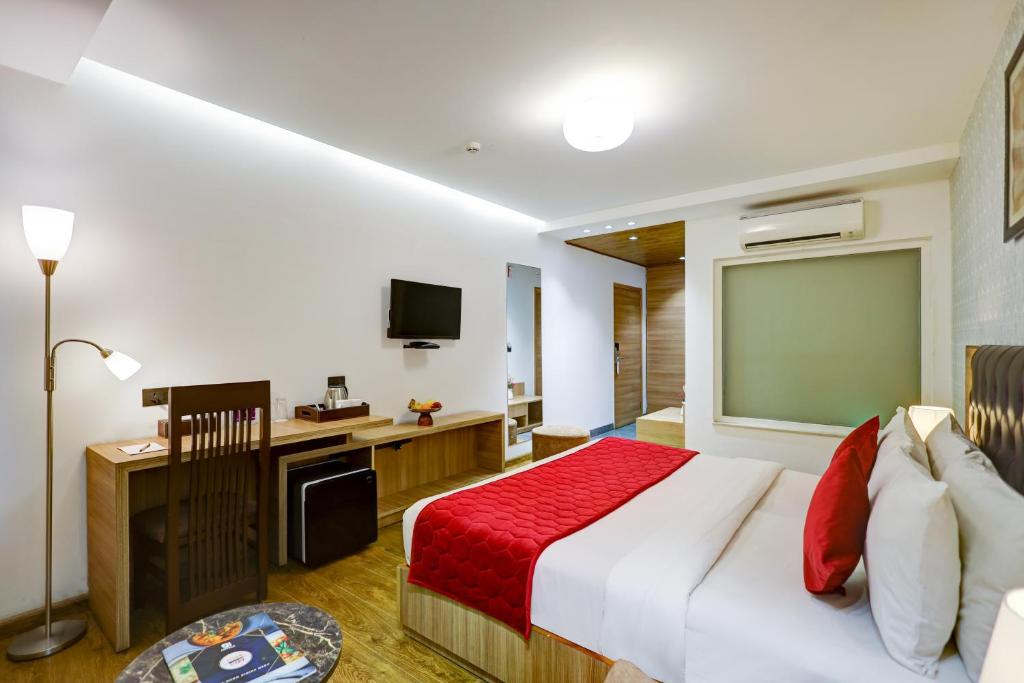Postel nebo postele na pokoji v ubytování Hotel 91 Huda City Centre
