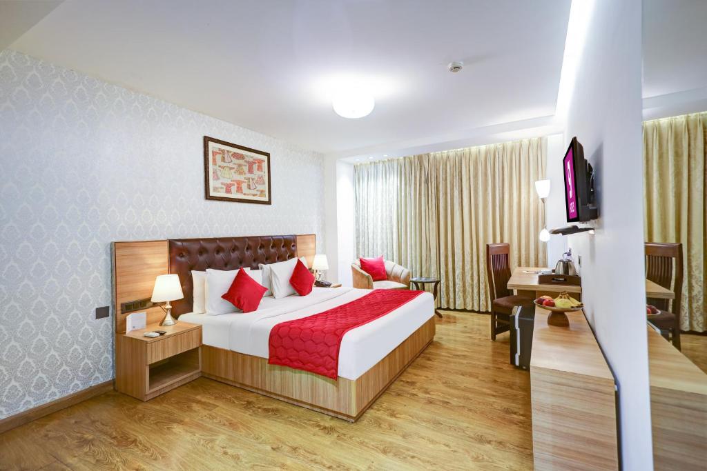 Postel nebo postele na pokoji v ubytování Hotel 91 Huda City Centre
