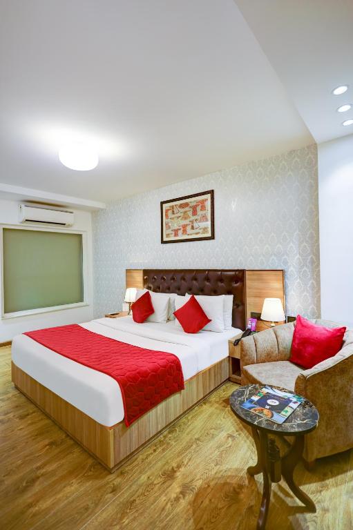 Postel nebo postele na pokoji v ubytování Hotel 91 Huda City Centre
