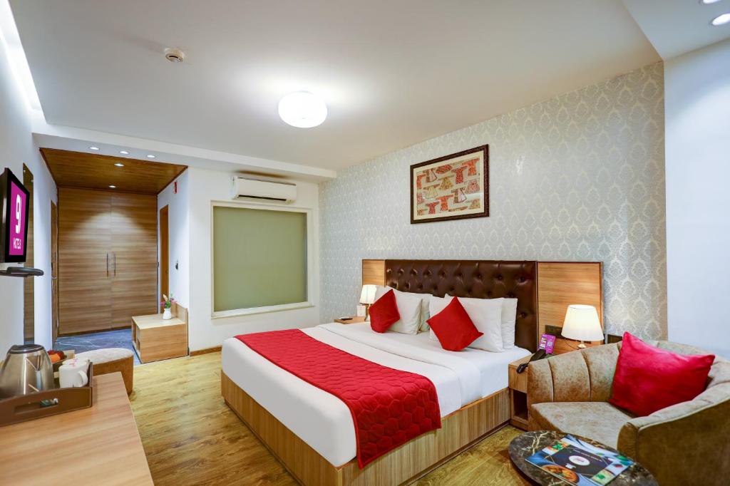 Postel nebo postele na pokoji v ubytování Hotel 91 Huda City Centre