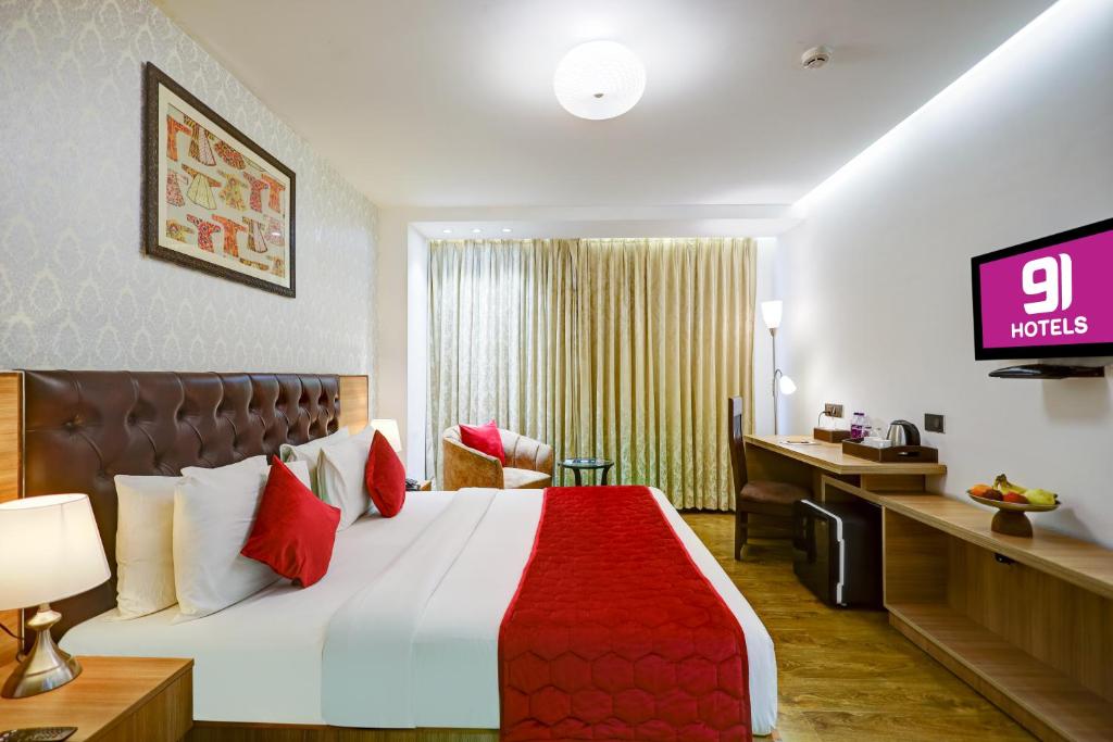 Postel nebo postele na pokoji v ubytování Hotel 91 Huda City Centre