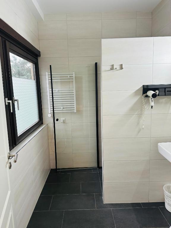 Koupelna v ubytování Hotel Pirol