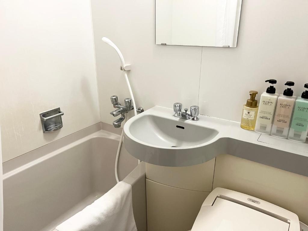 Koupelna v ubytování Nakamura Daiichi Hotel