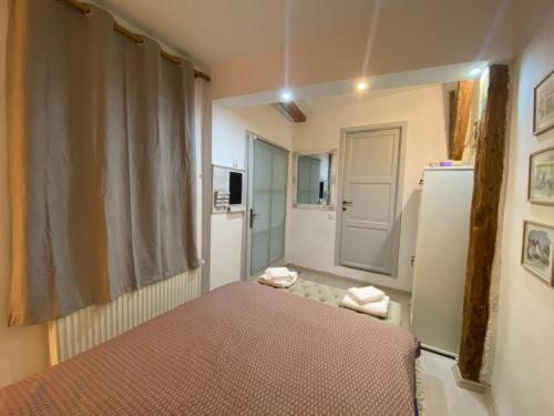 Postel nebo postele na pokoji v ubytování Liric Studio