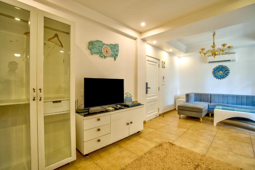 TV a/nebo společenská místnost v ubytování Hotel Pajaros Blu