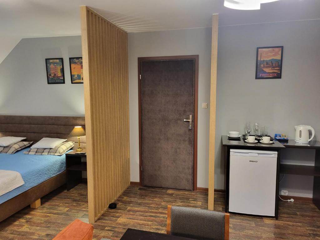 Postel nebo postele na pokoji v ubytování Pokoje Pod 22 Bis