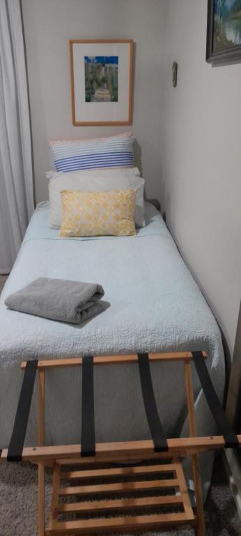 Postel nebo postele na pokoji v ubytování Hillview Homestay