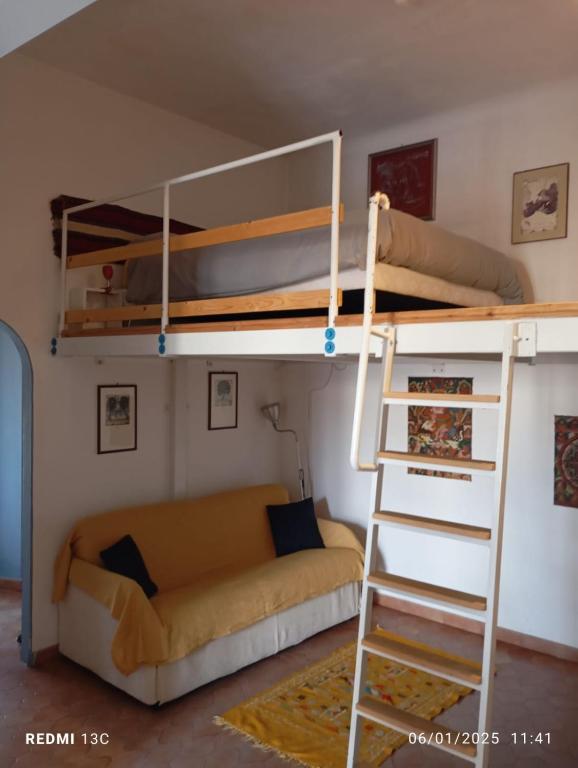 A bed or beds in a room at Casa Irma Confortevole appartamento nel cetro di prato