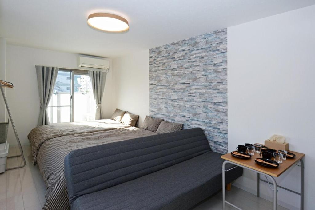 Katil atau katil-katil dalam bilik di LM401 Osaka Apartment Near Tsutenkaku Namba USJ Max 5pax Imamiya 大阪 通天閣 難波 USJ近く 最大5名 今宮 アパートメント