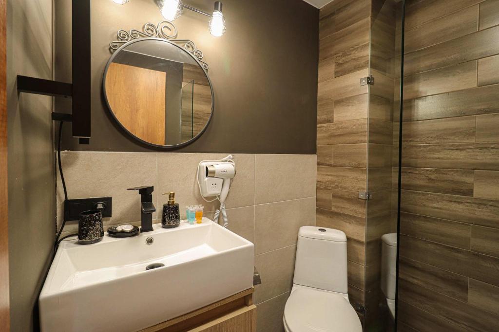Koupelna v ubytování Apartment in Marshall Gudauri Project