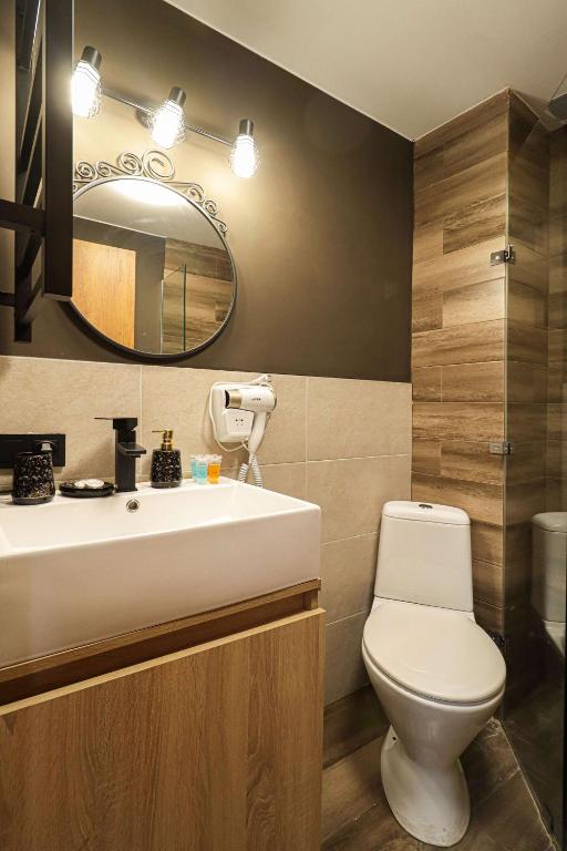 Koupelna v ubytování Apartment in Marshall Gudauri Project