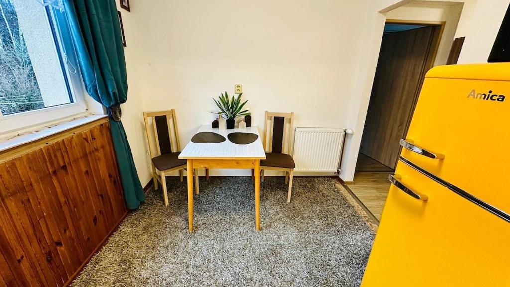 Kuchyň nebo kuchyňský kout v ubytování Rodinný apartmán na Šumavě