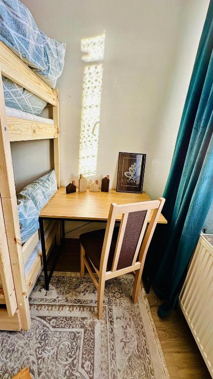 Postel nebo postele na pokoji v ubytování Rodinný apartmán na Šumavě
