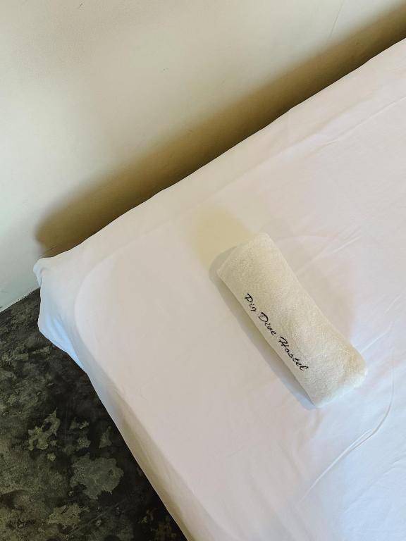 Krevet ili kreveti u jedinici u okviru objekta Pig Dive Hostel Moalboal