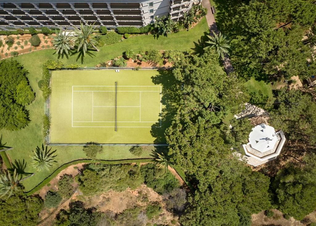 an overhead view of a tennis court in a park at PortoBay Blue Ocean in Albufeira
