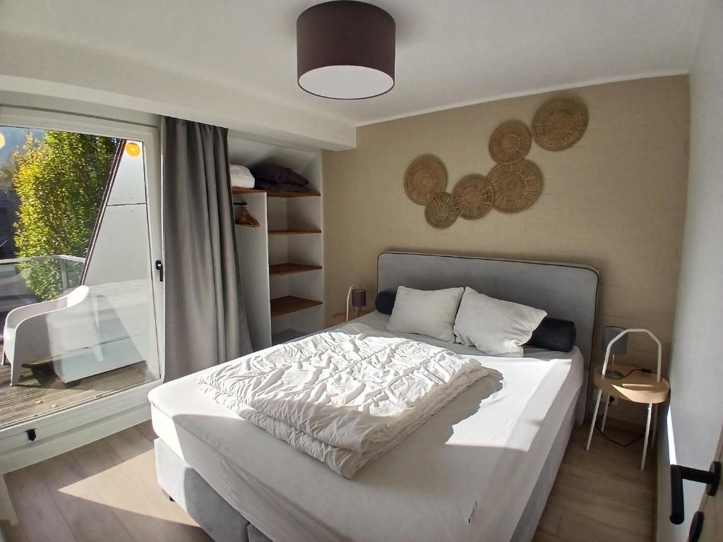 Postel nebo postele na pokoji v ubytování Bee Tree Appartement