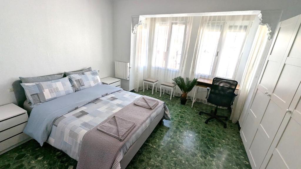 Postel nebo postele na pokoji v ubytování Reihenhaus in Alcanar mit Garage