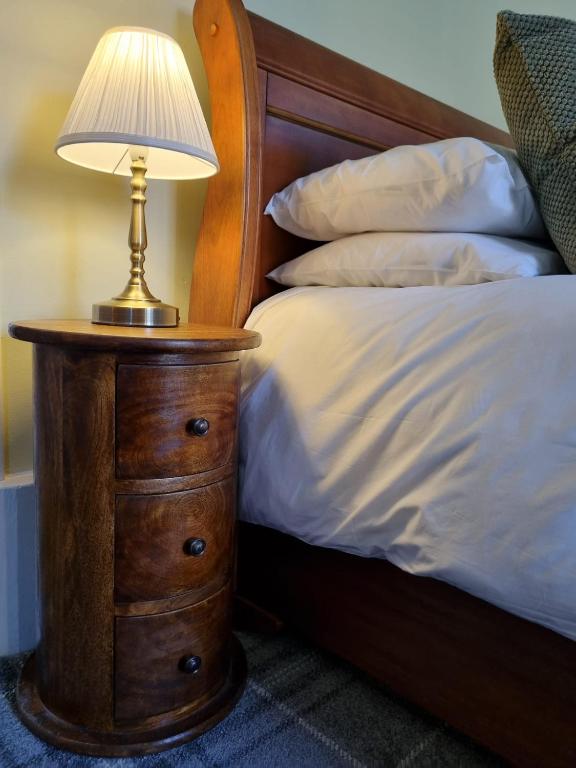 Postel nebo postele na pokoji v ubytování Knap Guest House