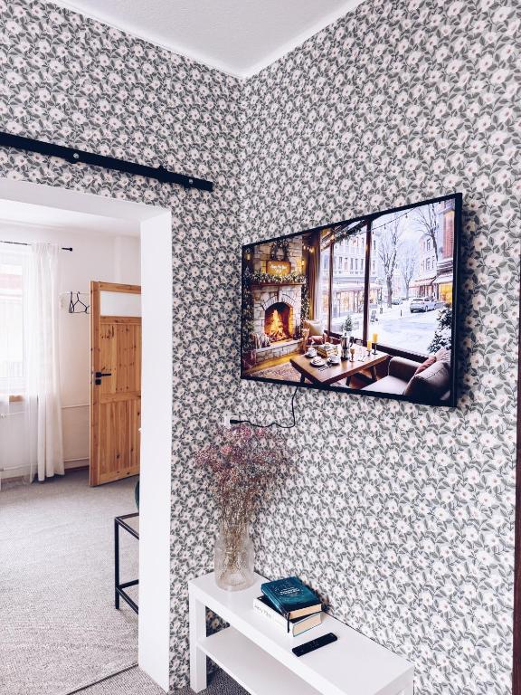 Televízia a/alebo spoločenská miestnosť v ubytovaní GóralSki