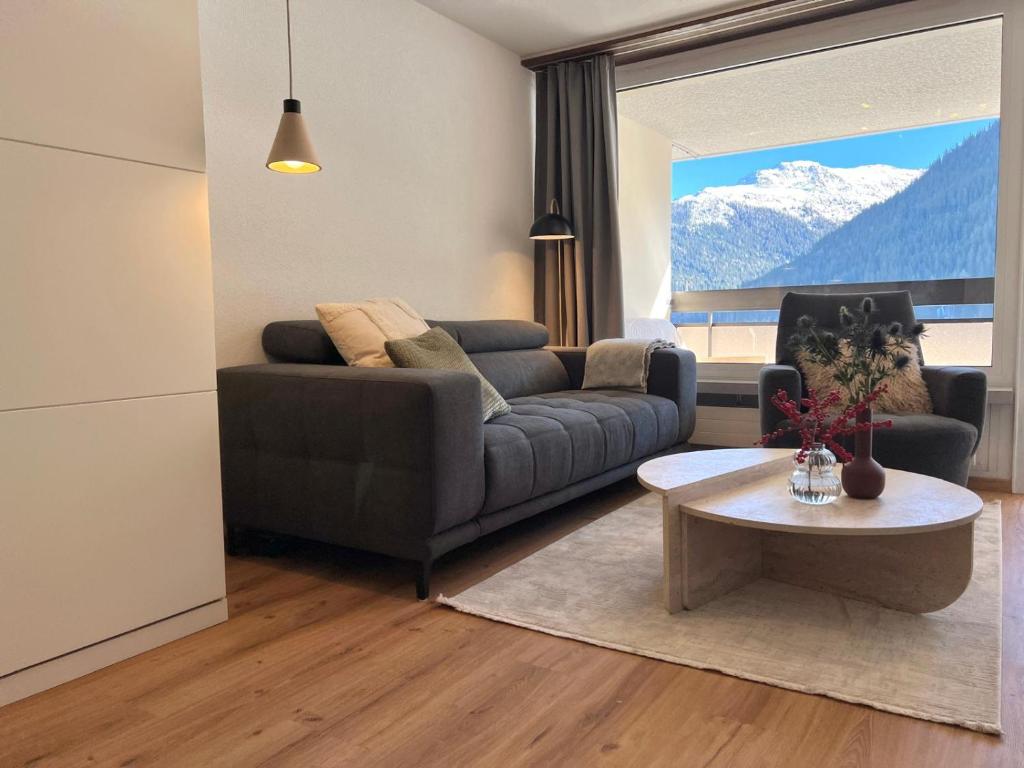 Posezení v ubytování New renovated apartment in center of Davos