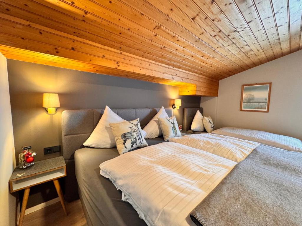 Postel nebo postele na pokoji v ubytování Gästehaus Johannes