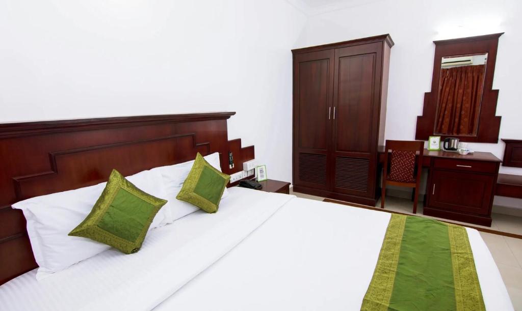 Postel nebo postele na pokoji v ubytování Hotel Centre Point