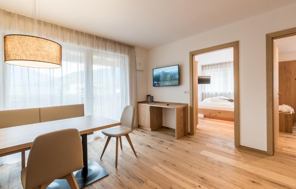 Postel nebo postele na pokoji v ubytování Hotel B&B Feldmessner