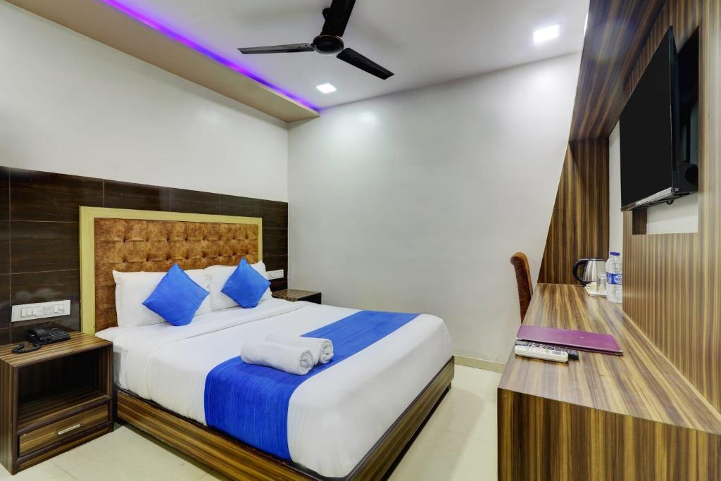 Postel nebo postele na pokoji v ubytování Hotel Blue Terminal