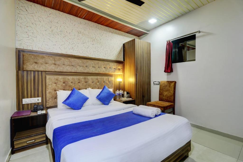 Postel nebo postele na pokoji v ubytování Hotel Blue Terminal