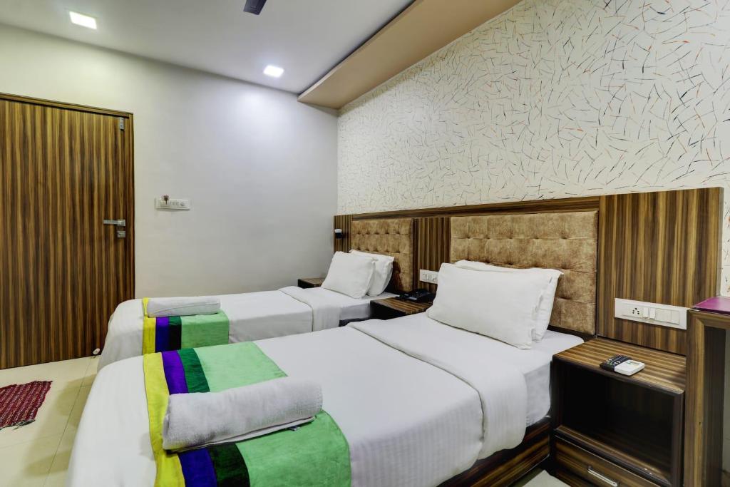 Postel nebo postele na pokoji v ubytování Hotel Blue Terminal