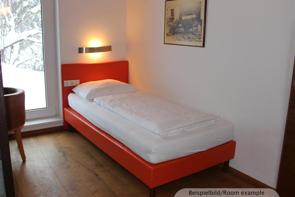 Postel nebo postele na pokoji v ubytování Sporthotel Shanti