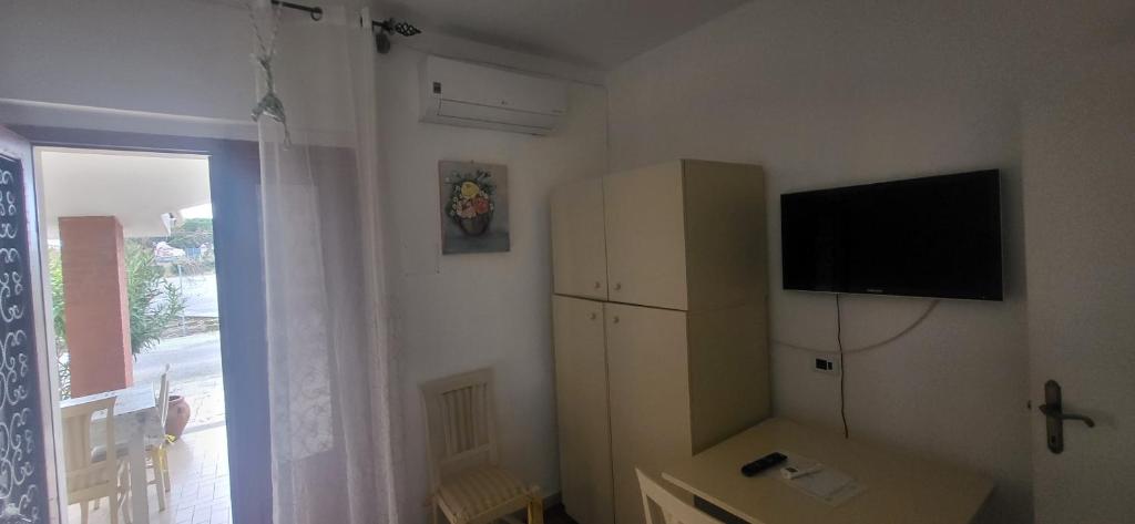 TV a/nebo společenská místnost v ubytování Hotel Dory