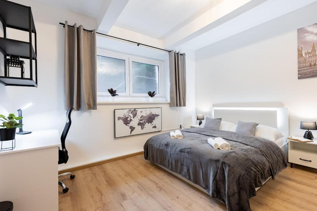 Posteľ alebo postele v izbe v ubytovaní Calm Center Modern Apartment