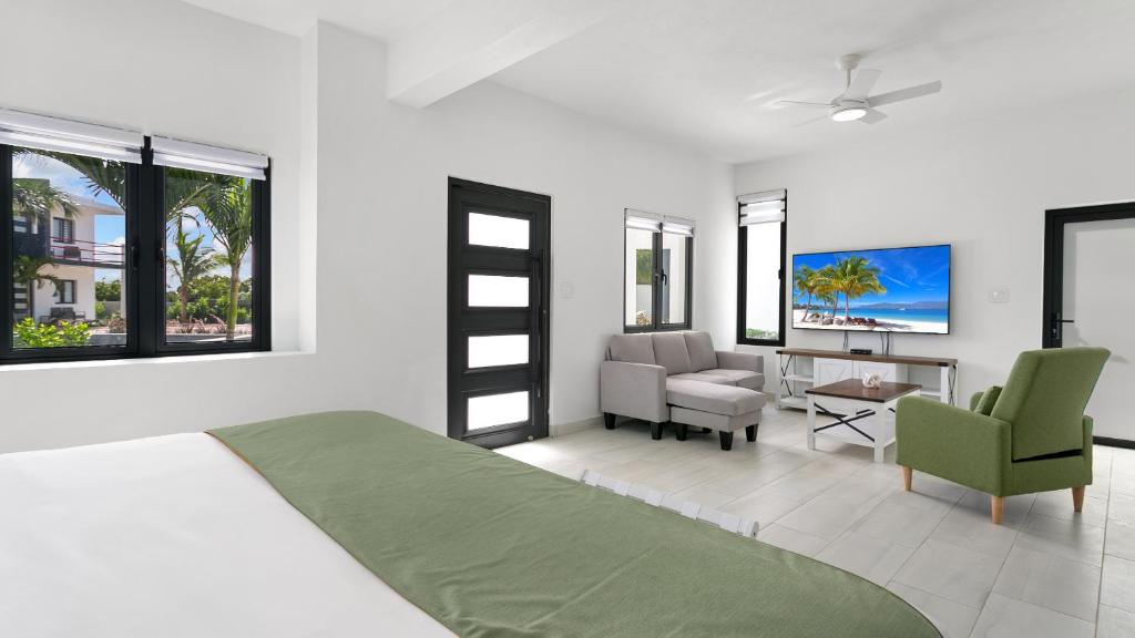 TV a/nebo společenská místnost v ubytování Genesis Residences