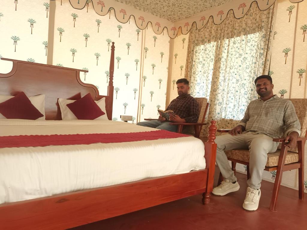 Postel nebo postele na pokoji v ubytování Braham Vatika Resort