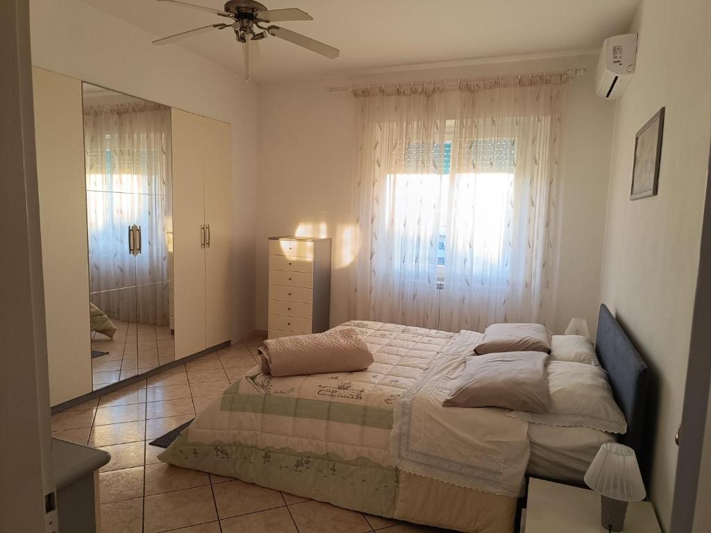 Posteľ alebo postele v izbe v ubytovaní L'appartamento delle vacanze