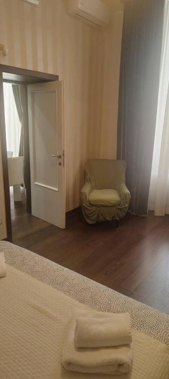 Posteľ alebo postele v izbe v ubytovaní Belledonne apartments
