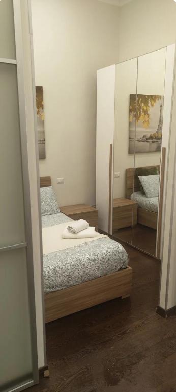 Posteľ alebo postele v izbe v ubytovaní Belledonne apartments