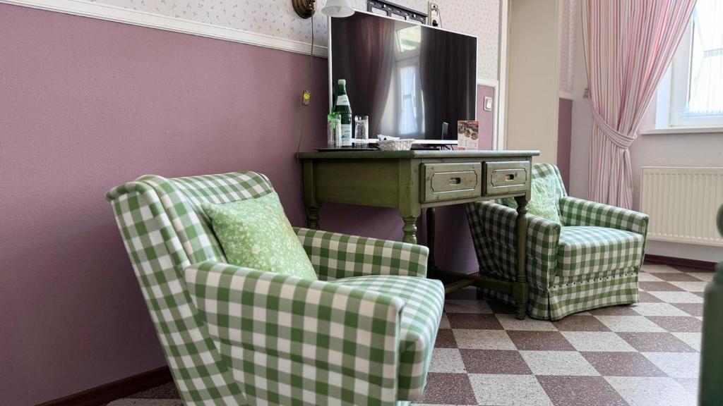 TV a/nebo společenská místnost v ubytování Hotel garni zur Post