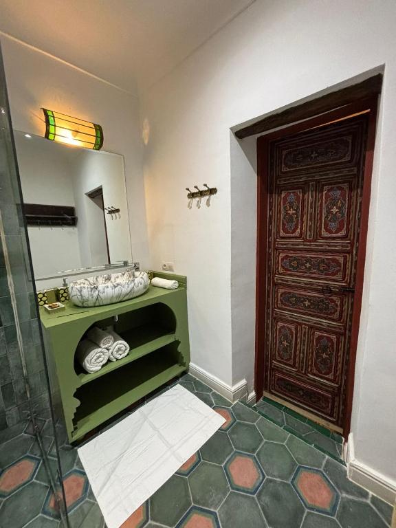 Postel nebo postele na pokoji v ubytování Riad bab Adam