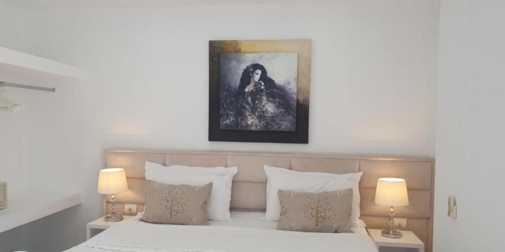 Postel nebo postele na pokoji v ubytování Ceko Hotel