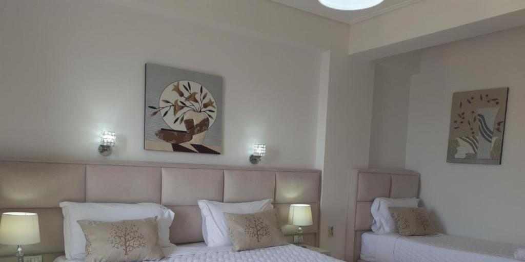 Postel nebo postele na pokoji v ubytování Ceko Hotel