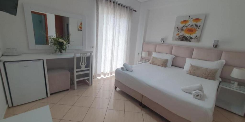 Postel nebo postele na pokoji v ubytování Ceko Hotel