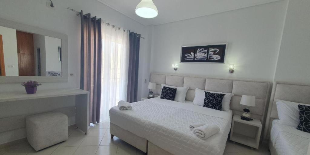 Postel nebo postele na pokoji v ubytování Ceko Hotel