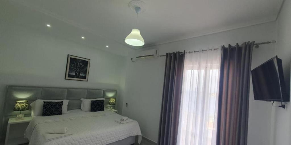 Postel nebo postele na pokoji v ubytování Ceko Hotel