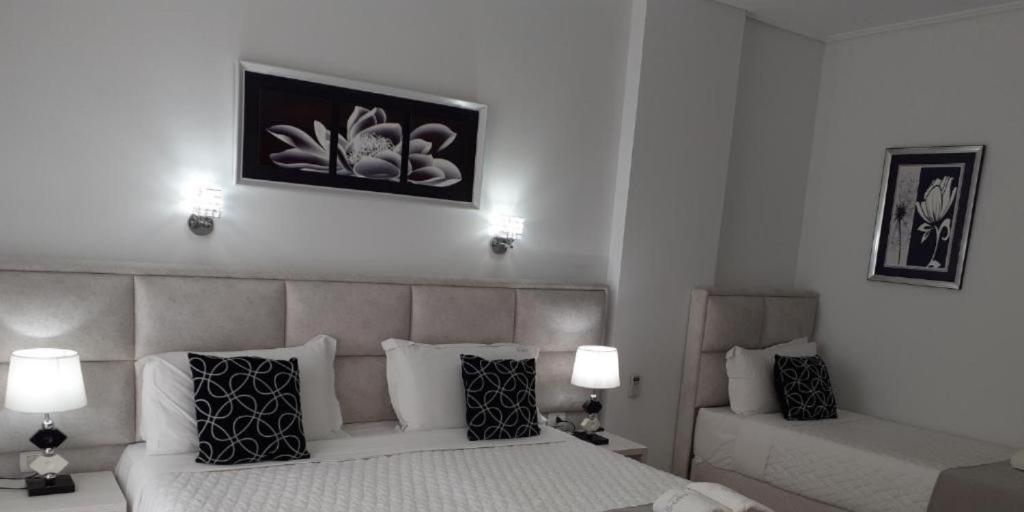 Postel nebo postele na pokoji v ubytování Ceko Hotel